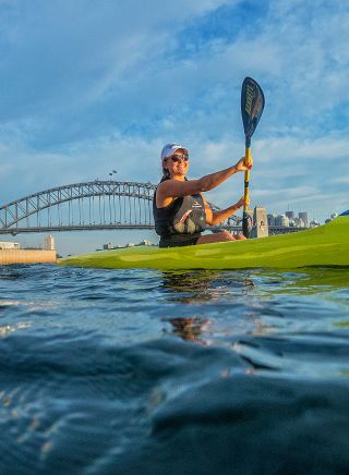 Kayakers enjoying Sydney Harbour near the Sydney Opera House with the Sydney Harbour Bridge in the background, Sydney Harbour