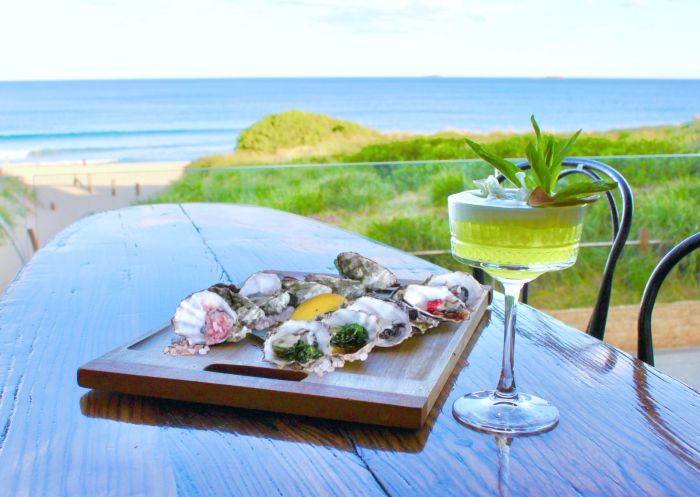 Cocktails and oysters by the sea a la carte at Steamers Bar and Grill in Wollongong , South Coast