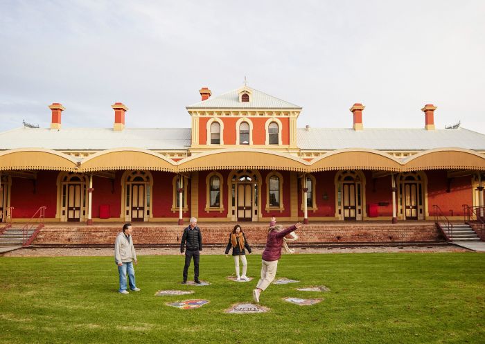 Group playing on the lawn at Dunera Museum, Hay