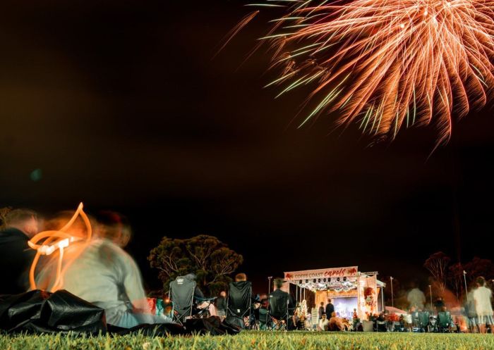 People enjoying fireworks at Coffs Coast Carols, Coffs Harbour