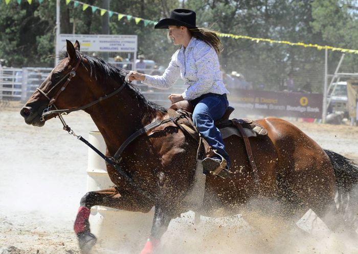 Woman on horseback at the Narranderra Rodeo, Narrandera