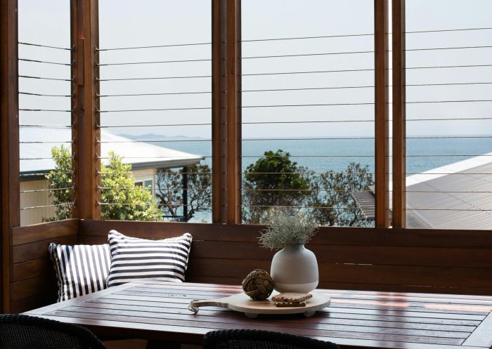 Balcony with ocean views at Reflections Bonny Hills, Bonny Hills