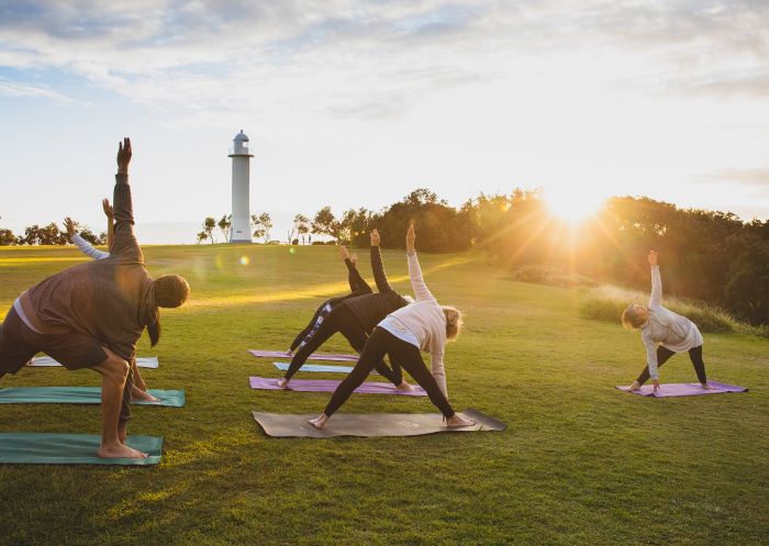 People enjoying a Yoga Room class in Wooli Park, Yamba, Clarence Valley 