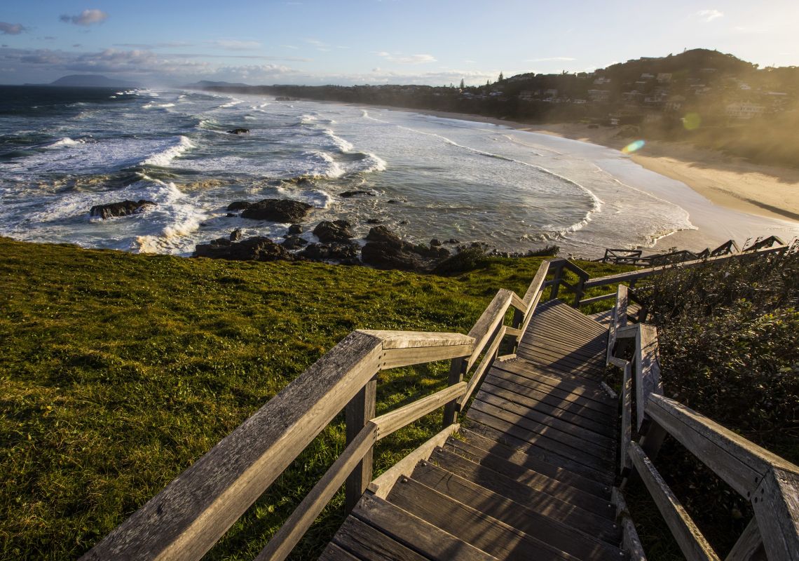 Wooden stairs descend from Tacking Point to Lighthouse Beach, Port Macquarie 