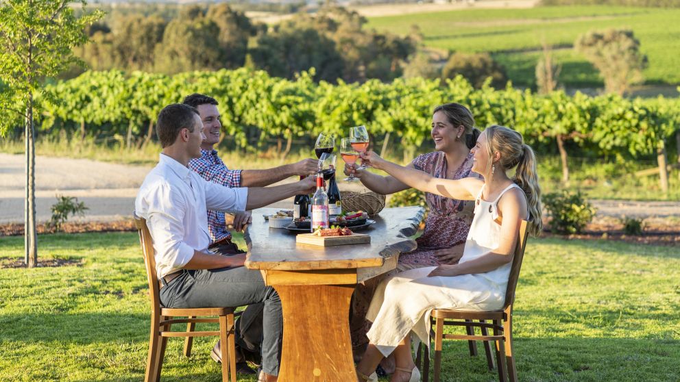 Couples enjoying food and wine at Grove Estate Wines in Young, Country NSW