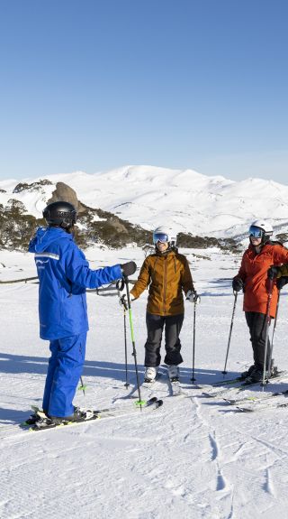 Ski instructor with students, Perisher - Credit: Perisher Resort