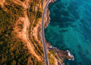 Aerial over Sea Cliff Bridge, Grand Pacific Drive - South Coast 