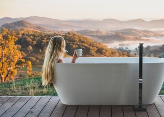 Woman enjoying her stay at Sierra Escape, Piambong near Mudgee
