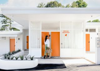 Exterior with woman wallking, The Berry View, Jervis Bay - Credit: The Berry View