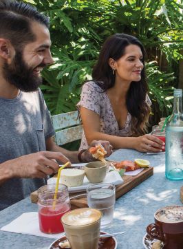 Friends enjoying a relaxed breakfast at Cafe Enzo, Pokolbin