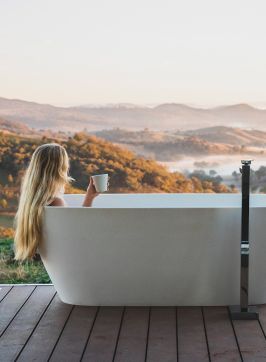 Woman enjoying her stay at Sierra Escape, Piambong near Mudgee