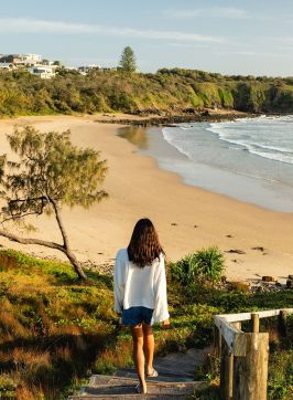 Woman heads towards Shelly Beach, Look At Me Now Headland Walk, Emerald Beach