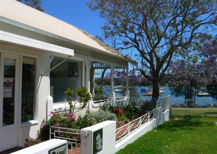 Entrance to Dobell House with views towards boats moored on Lake Macquarie