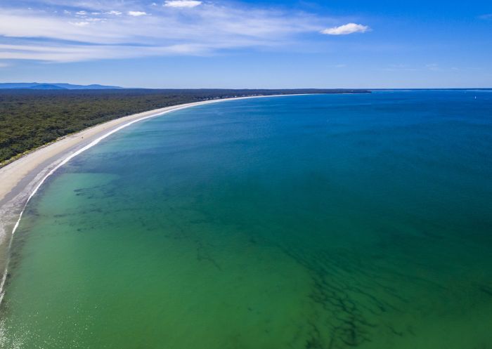 Aerial view of the beach with white sand, Callala Beach - Credit: Andy Hutchinson | Shoalhaven Tourism