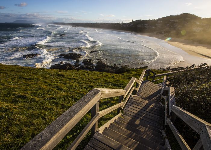 Wooden stairs descend from Tacking Point to Lighthouse Beach, Port Macquarie 