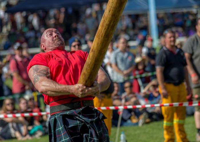 Caber tossing at the Bundanoon Highland Gathering Festival, Southern Highlands