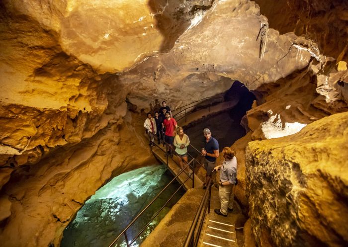 Small group enjoying a tour through the River Cave system at Jenolan Caves, Blue Mountains