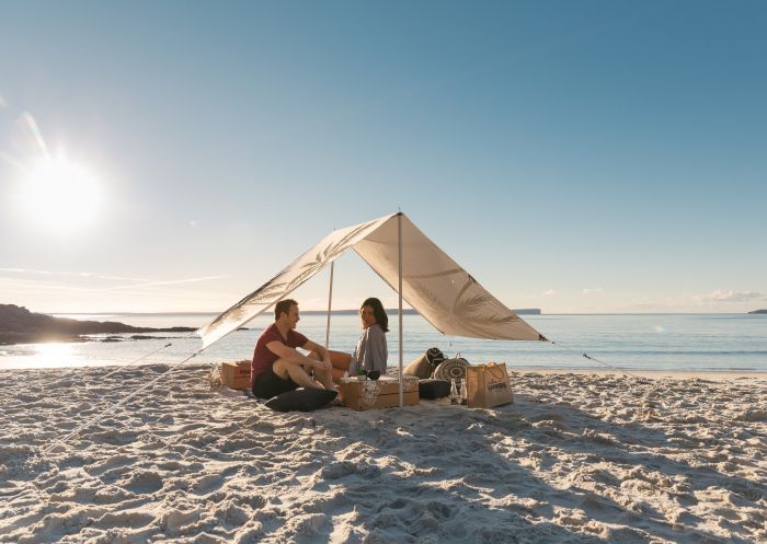 Couple enjoying a picnic, Hyams Beach Hampers, Blenheim Beach, Jervis Bay 