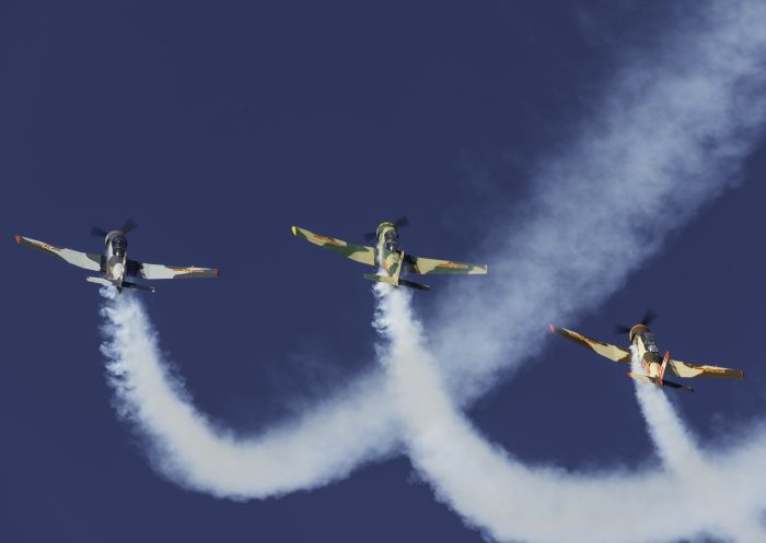 Aircraft performing aerobatic displays for crowds at the 2018 Wings Over Illawarra Event, Illawarra Regional Airport.
