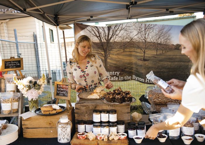 Couple enjoying a day of shopping for arts & crafts and local produce at Nimbin Markets, Lismore