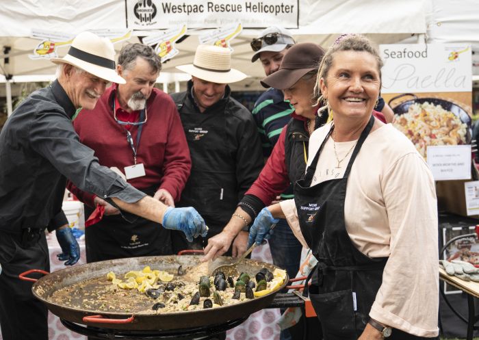 Westpac Helicopter Rescue Service team with their Seafood Paella at the 2019 Moree on a Plate Festival in Moree, Country NSW