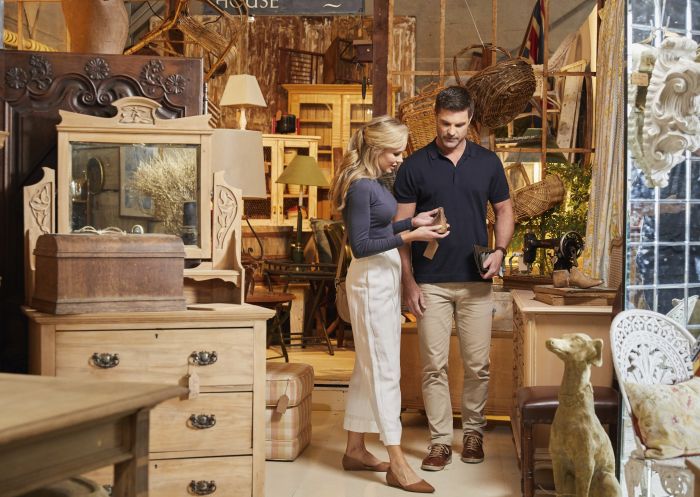 Couple browsing for antiques at Dirty Janes antique market in Bowral, Southern Highlands