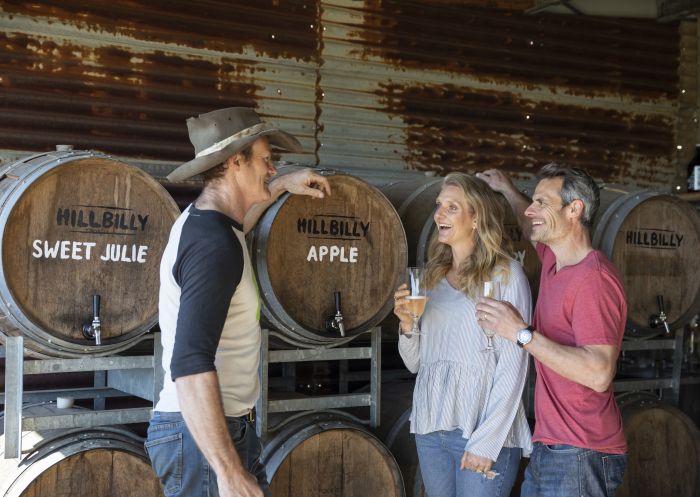Couple enjoying tastings at Hillbilly Cider, Bilpin