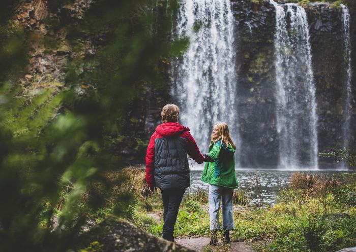 Couple enjoying a walk to the bottom of Dangar Falls in Dorrigo