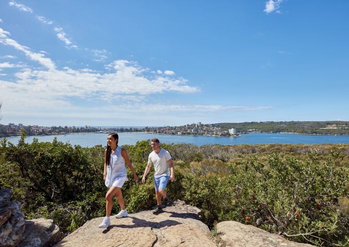 Couple enjoying stunning coastal views of Sydney Harbour from Dobroyd Head, Balgowlah Heights, Sydney
