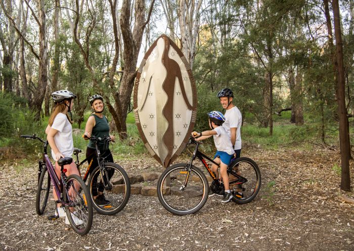 Family enjoying biking at Wagirra Trail and Yindyamarra Sculpture Walk in West Albury - Murray - Country NSW