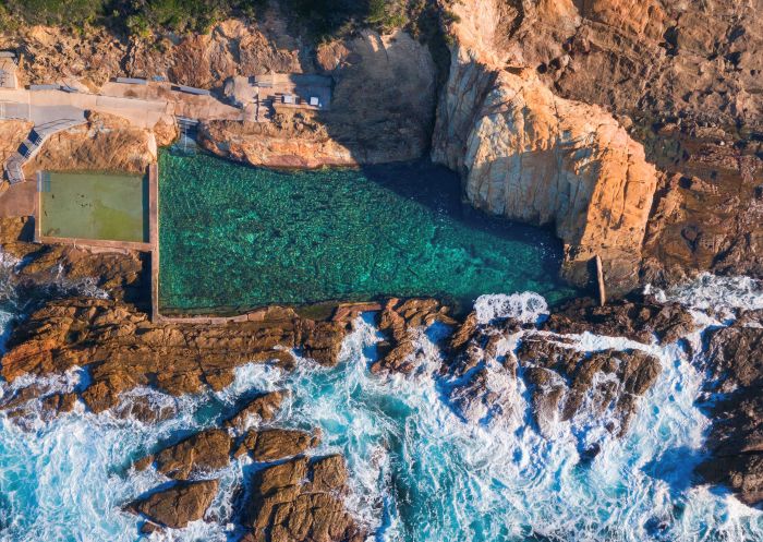 Aerial of the Blue Pool situated along the Bermagui coastline - Sapphire Coast 
