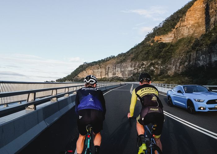Cycling at Sea Cliff Bridge in Wollongong, South Coast