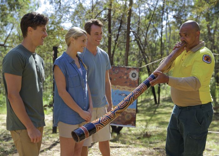 A Wiradjuri guide demonstrates the didgeridoo (also known as didjeridu) as part of the Wiradjuri Aboriginal Culture Tour in Tumut