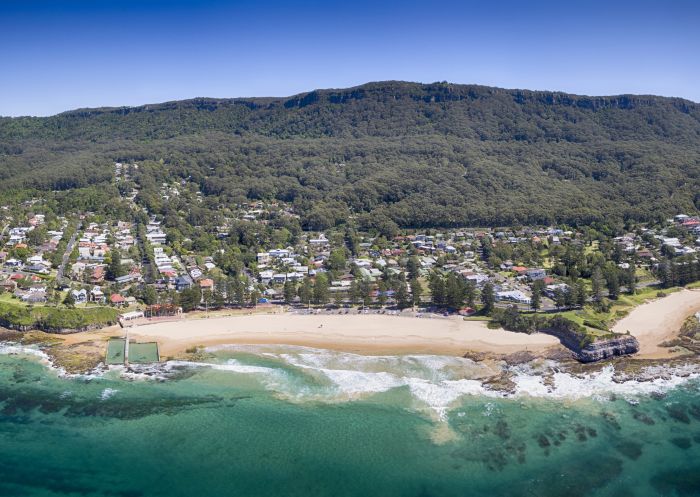 Aerial overlooking Austinmer Beach with views through to Sublime Point, Wollongong