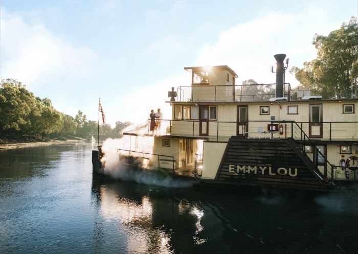 Couple aboard the Paddlesteamer Emmylou as it cruises along the Murray River