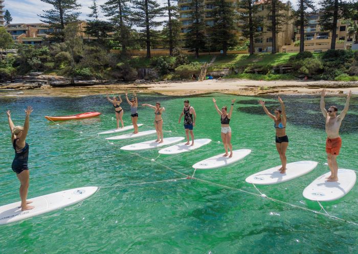 Yoga on stand-up paddle boards with Flow mOcean in Manly, Sydney North