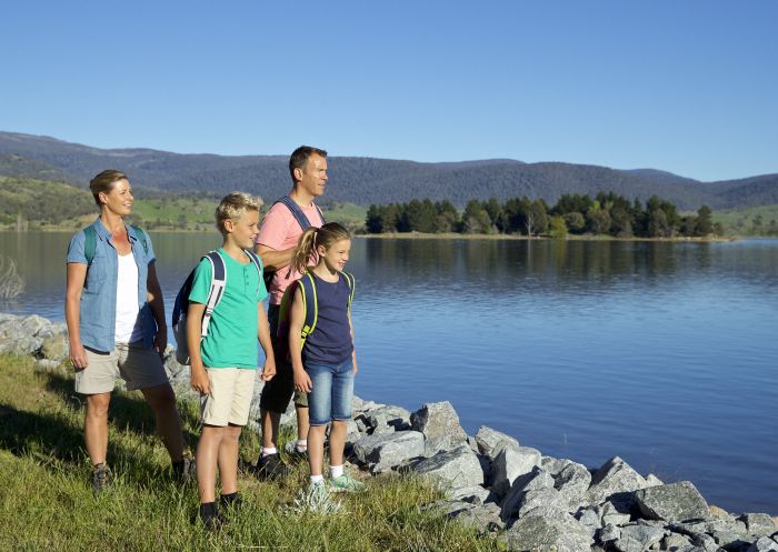 Family enjoying a scenic hike around Lake Jindabyne in the Snowy Mountains
