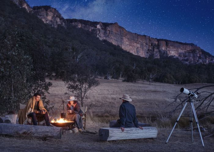 Guests enjoying a stargazing campfire experience at Emirates One&Only Wolgan Valley.