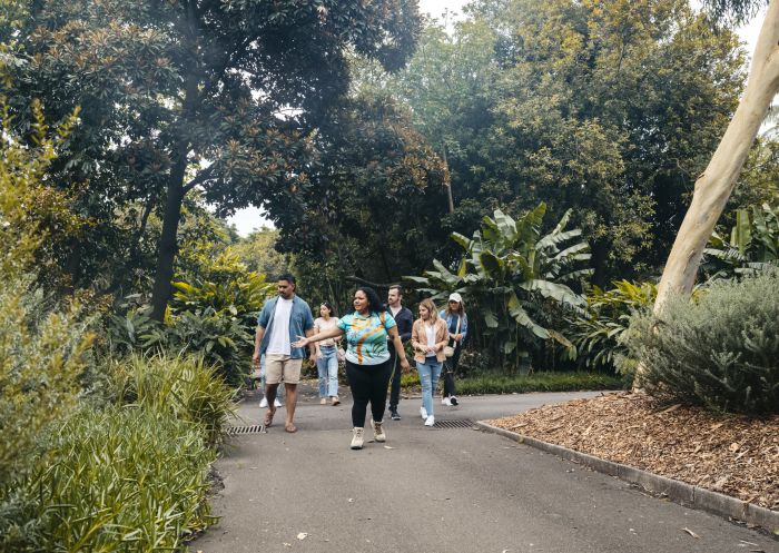 Guests learning about the rich Aboriginal culture of the Gadigal people on a guided tour in the Royal Botanic Garden Sydney, Sydney City