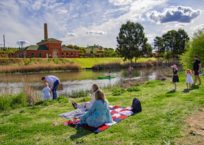 Family picnic and water activities at Goulburn Historic Waterworks in Goulburn, Country NSW