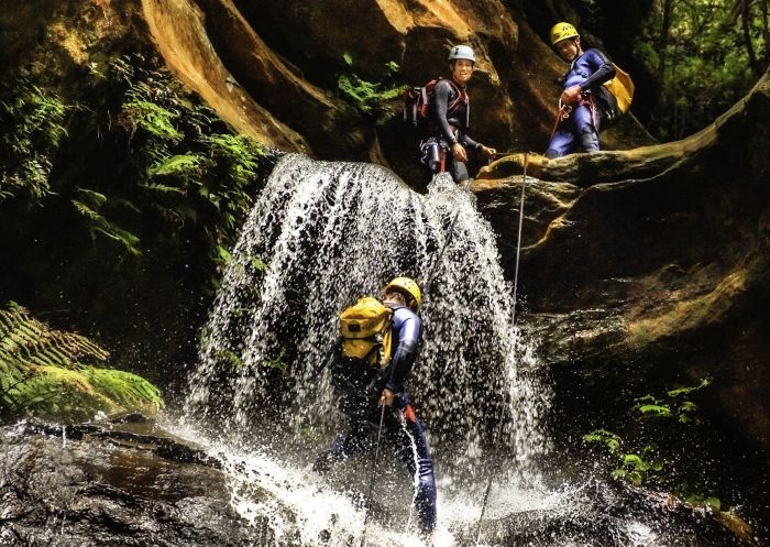 Group abseiling down Empress Falls, Blue Mountains