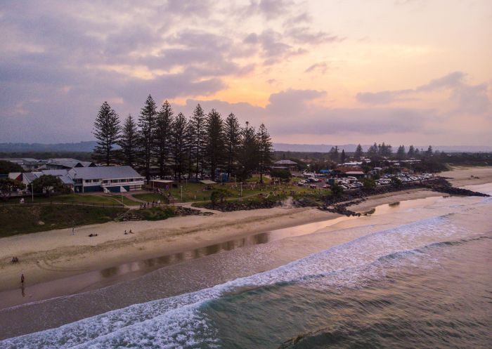 Sun setting over Main Beach in Byron Bay, North Coast