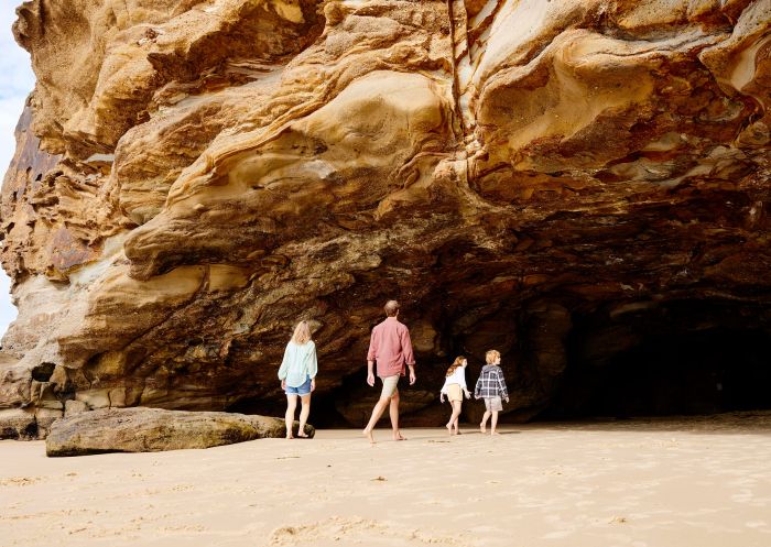 Family walking at Caves Beach, Lake Macquarie