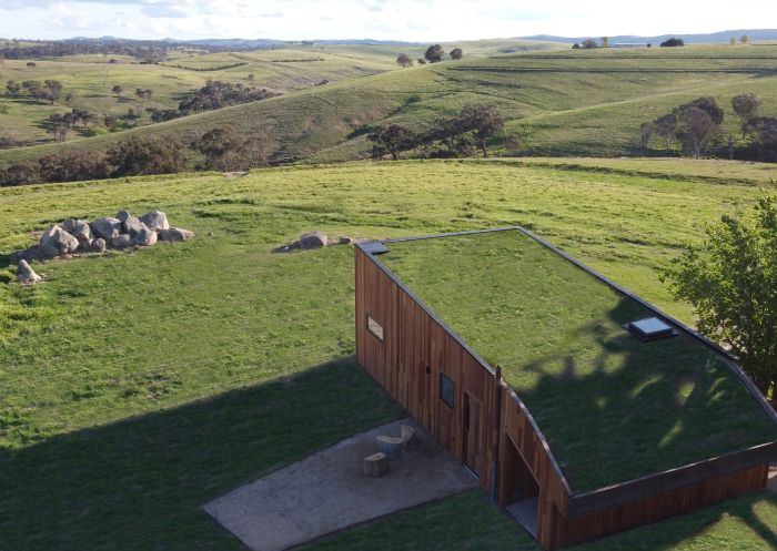 A grass roof, off the grid, luxury one bedroom “Farmers Hut”, Evans Plains
