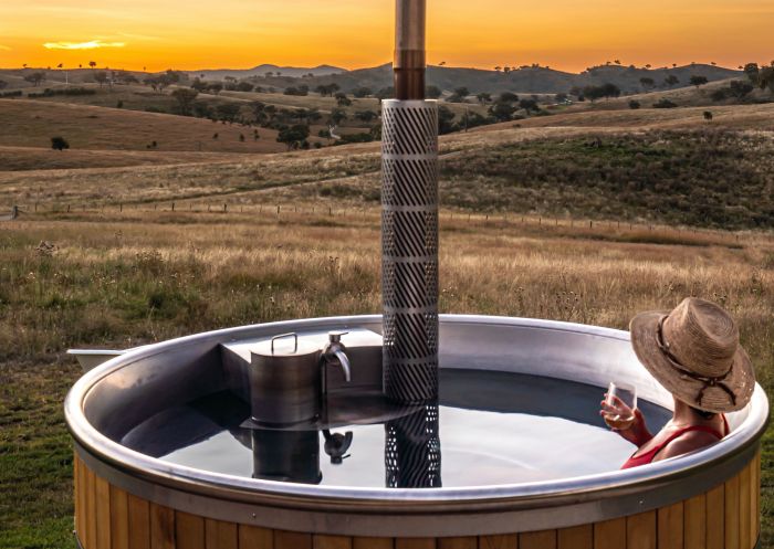 Enjoy watching the sunset in our wood fired hot tub sipping some Mudgee wine at Glenayr Farm, Mudgee