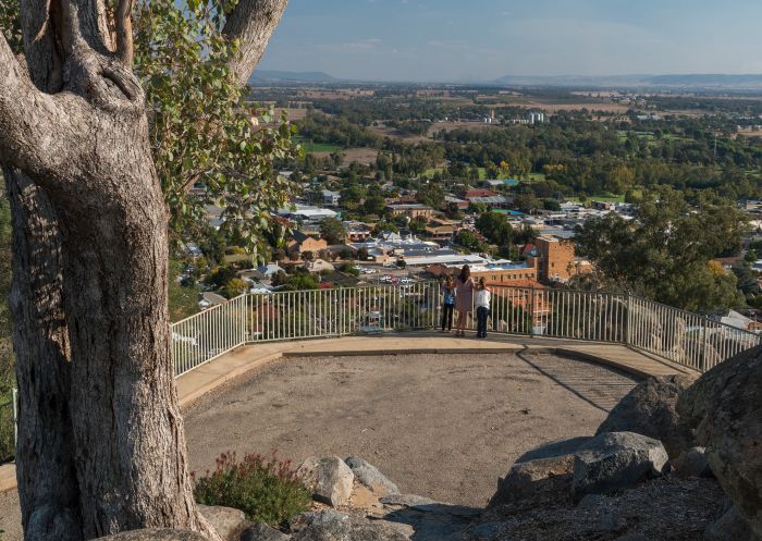 Family enjoying views overlooking Cowra from the Bellevue Hill Lookout, Cowra