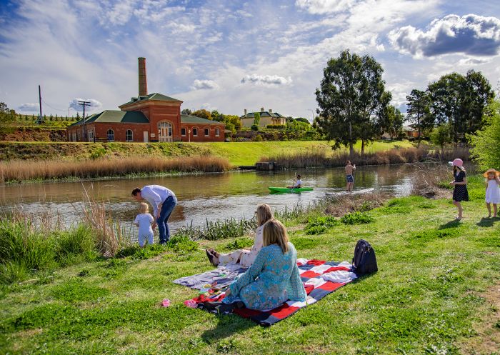 Family picnic and water activities at Goulburn Historic Waterworks in Goulburn, Country NSW