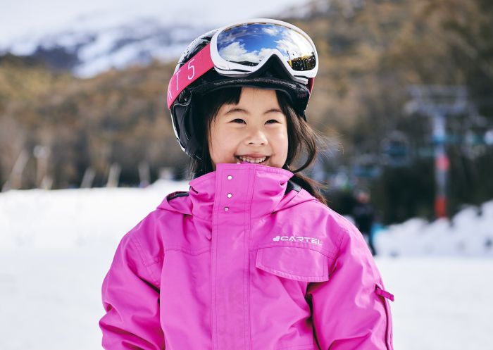 Young girl enjoying a day of skiing at Thredbo, Snowy Mountains