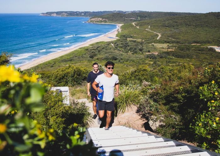 Couple enjoying a scenic walk along the Hickson Street Trail, Merewether