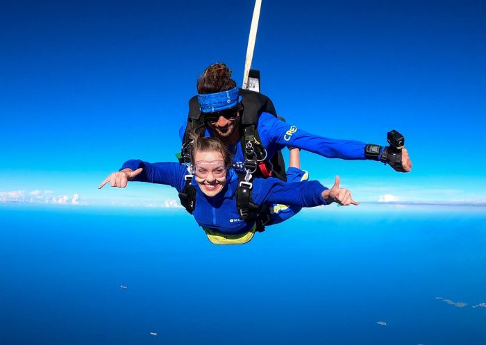 Woman skydiving over Wollongong with Skydive Australia, Wollongong